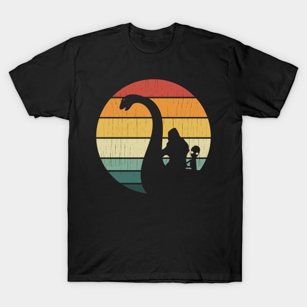 Bigfoot And Alien Riding Loch Ness Monster T-Shirt by Tesszero